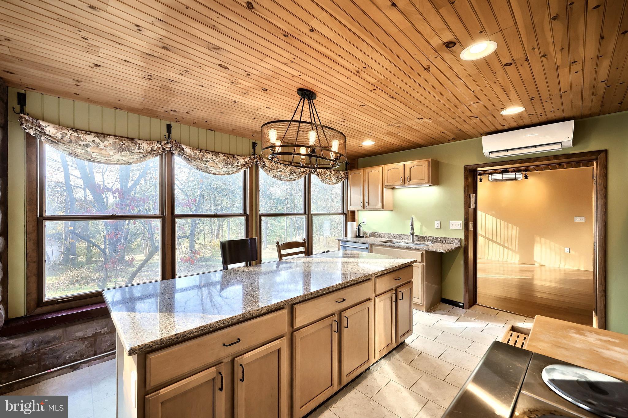 6691 Harmony Grove Road Dover, PA 17315 - Photo 15 of 66 a kitchen with sink cabinets and outdoor view