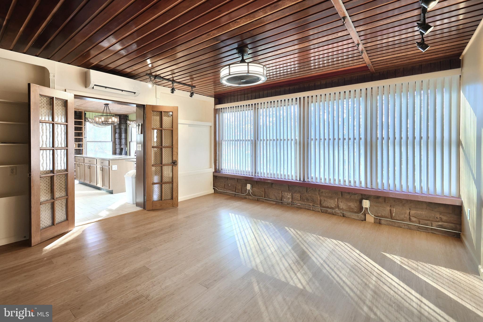 6691 Harmony Grove Road Dover, PA 17315 - Photo 16 of 66 a view of an empty room with wooden floor