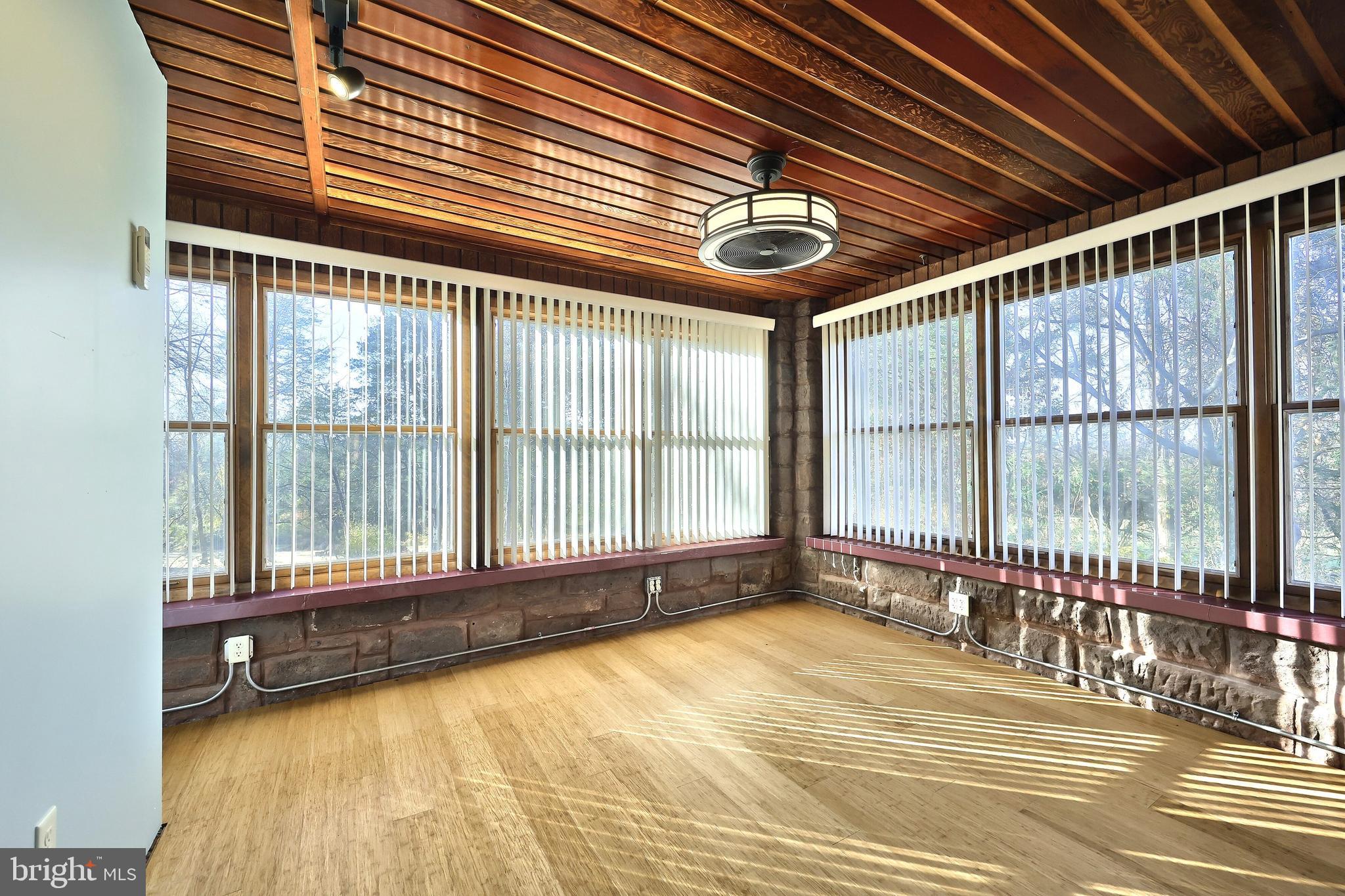 6691 Harmony Grove Road Dover, PA 17315 - Photo 18 of 66 a view of an empty room with a balcony