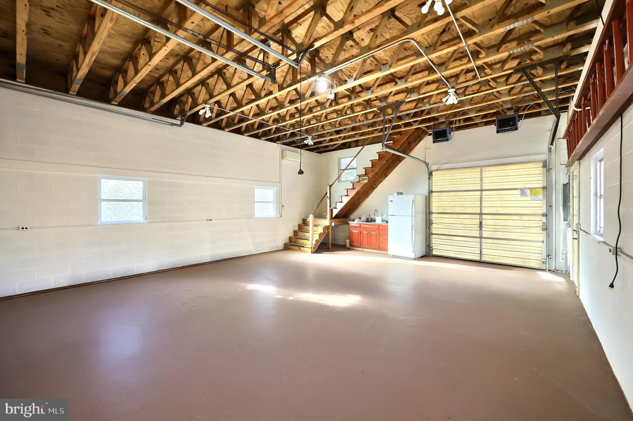6691 Harmony Grove Road Dover, PA 17315 - Photo 43 of 66 a view of an empty room with a window