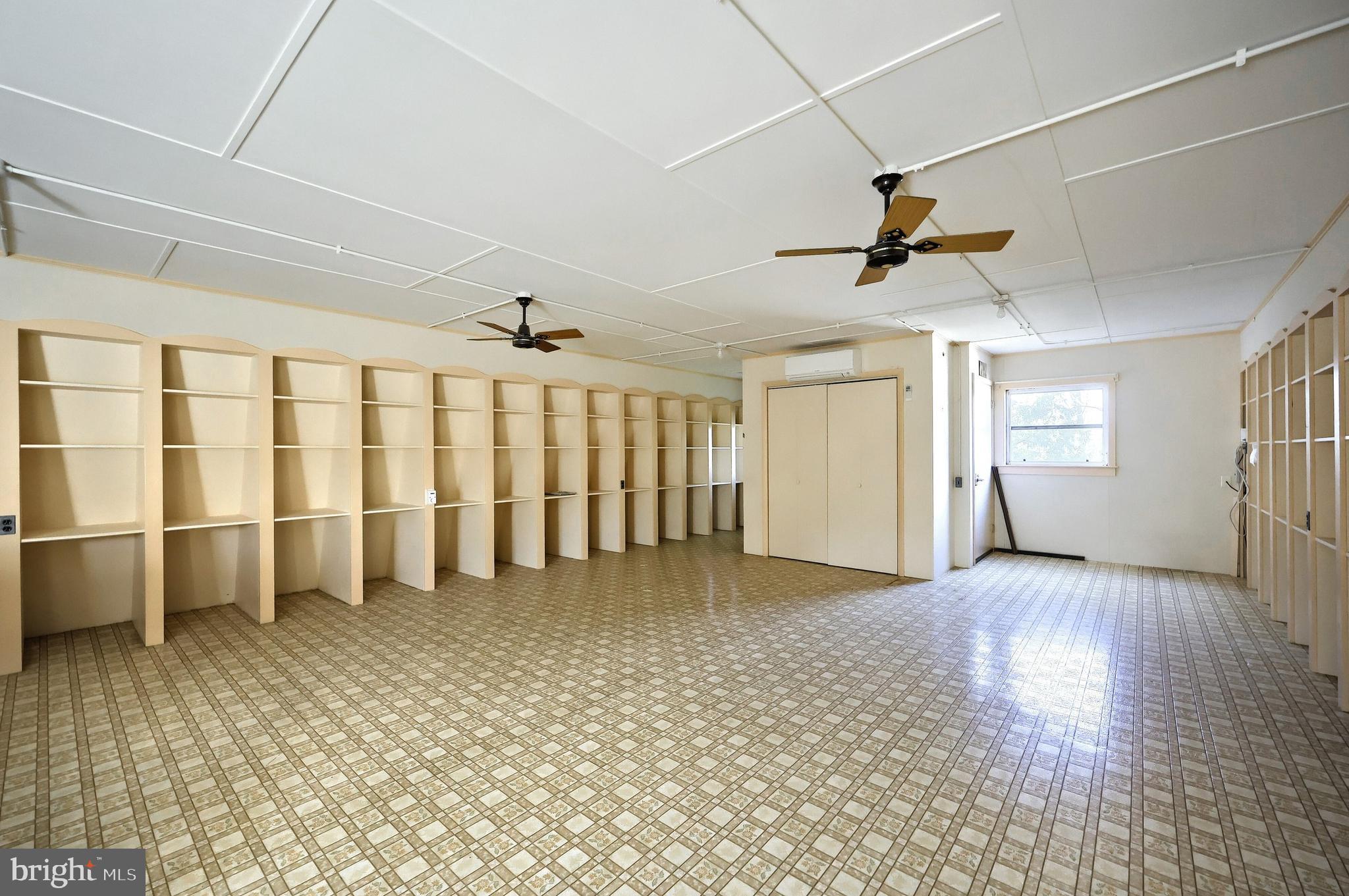 6691 Harmony Grove Road Dover, PA 17315 - Photo 45 of 66 a view of an empty room with a window