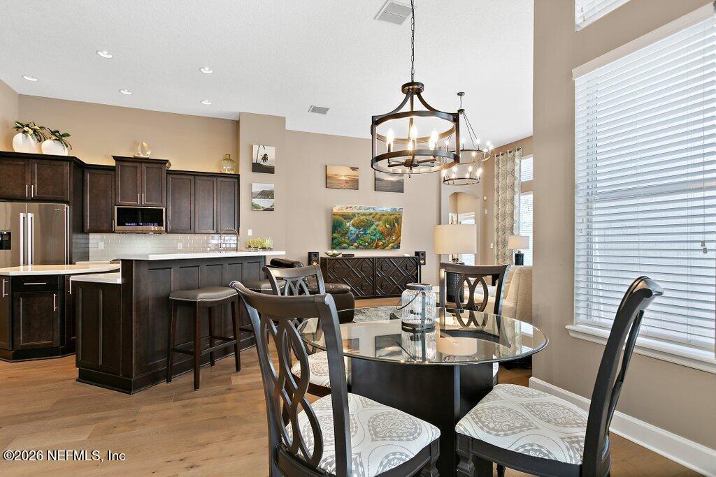 841 Ifield Road St. Augustine, FL 32095 - Photo 20 of 69 a view of a dining room with furniture