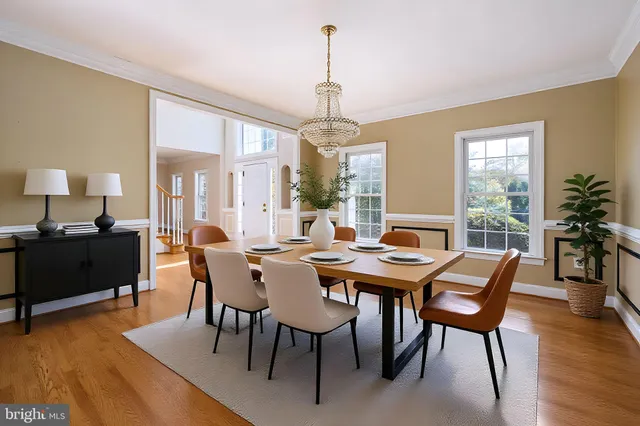 a view of a livingroom with a fireplace and window