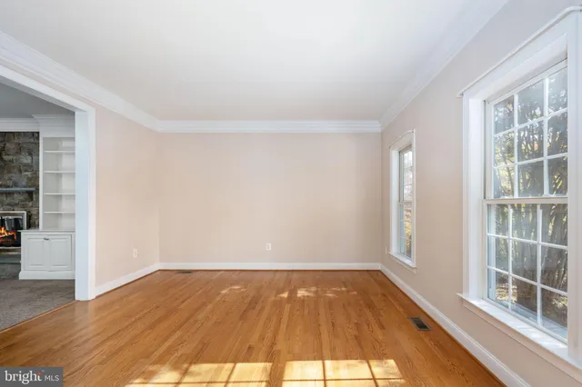 a kitchen with stainless steel appliances granite countertop a refrigerator a sink a stove and oven