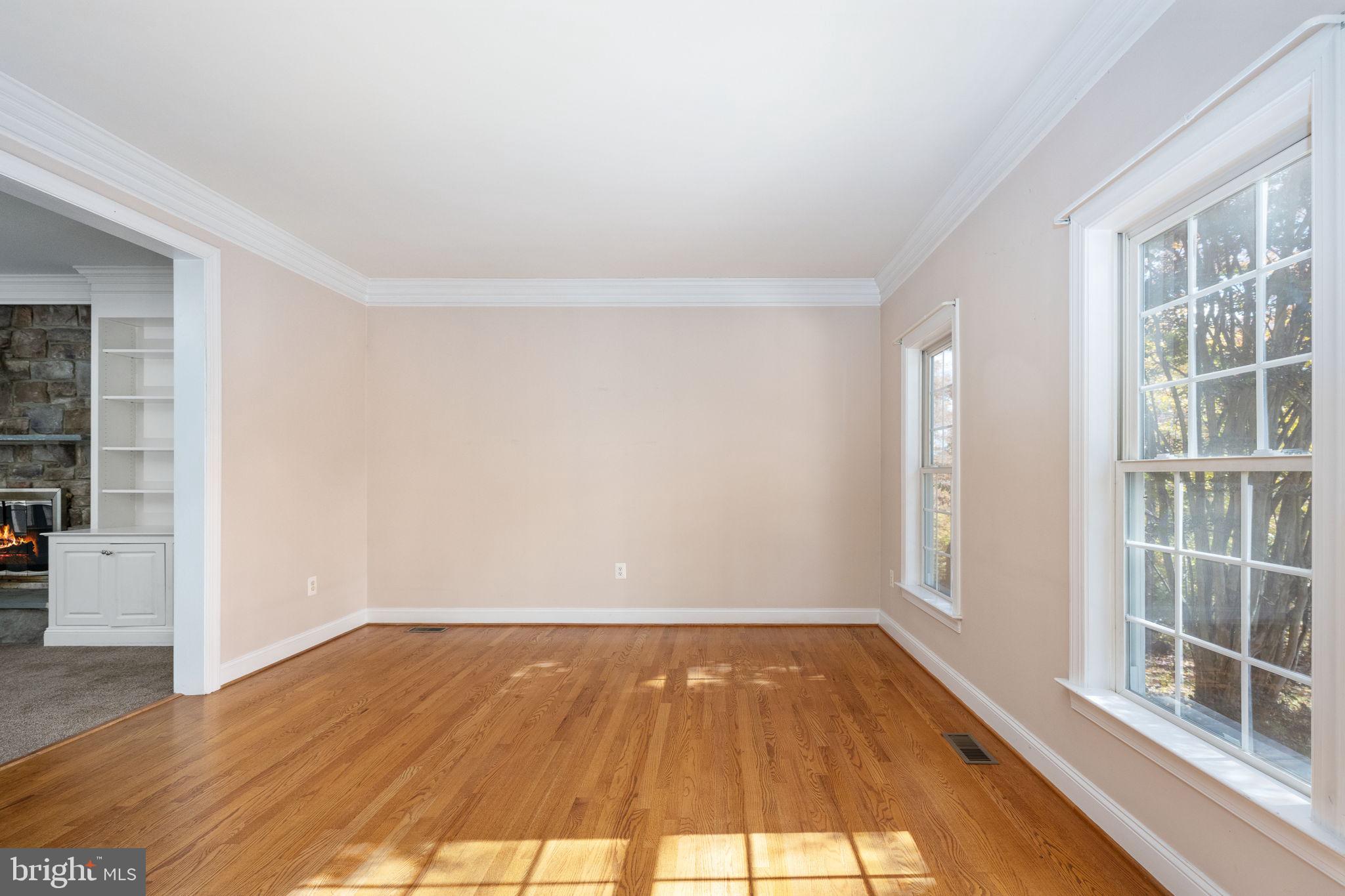 231 Kimberwick Lane Stafford, VA 22556 - Photo 14 of 78 wooden floor in an empty room with a window