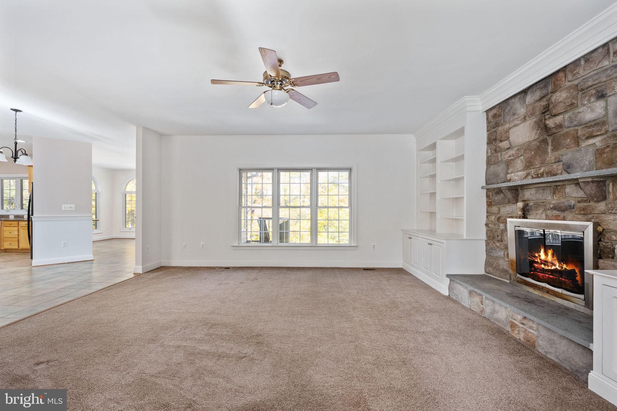 231 Kimberwick Lane Stafford, VA 22556 - Photo 19 of 78 a view of a livingroom with a fireplace and window