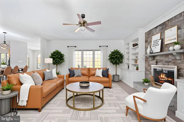 a view of a kitchen with granite countertop a sink and a window