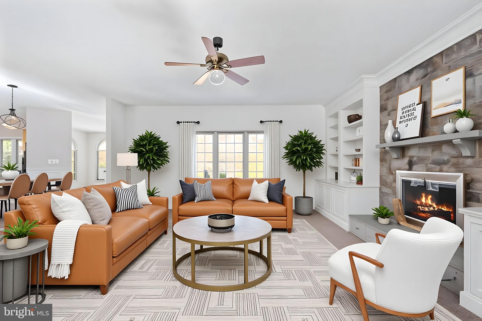 231 Kimberwick Lane Stafford, VA 22556 - Photo 20 of 78 a living room with furniture a chandelier and a fireplace
