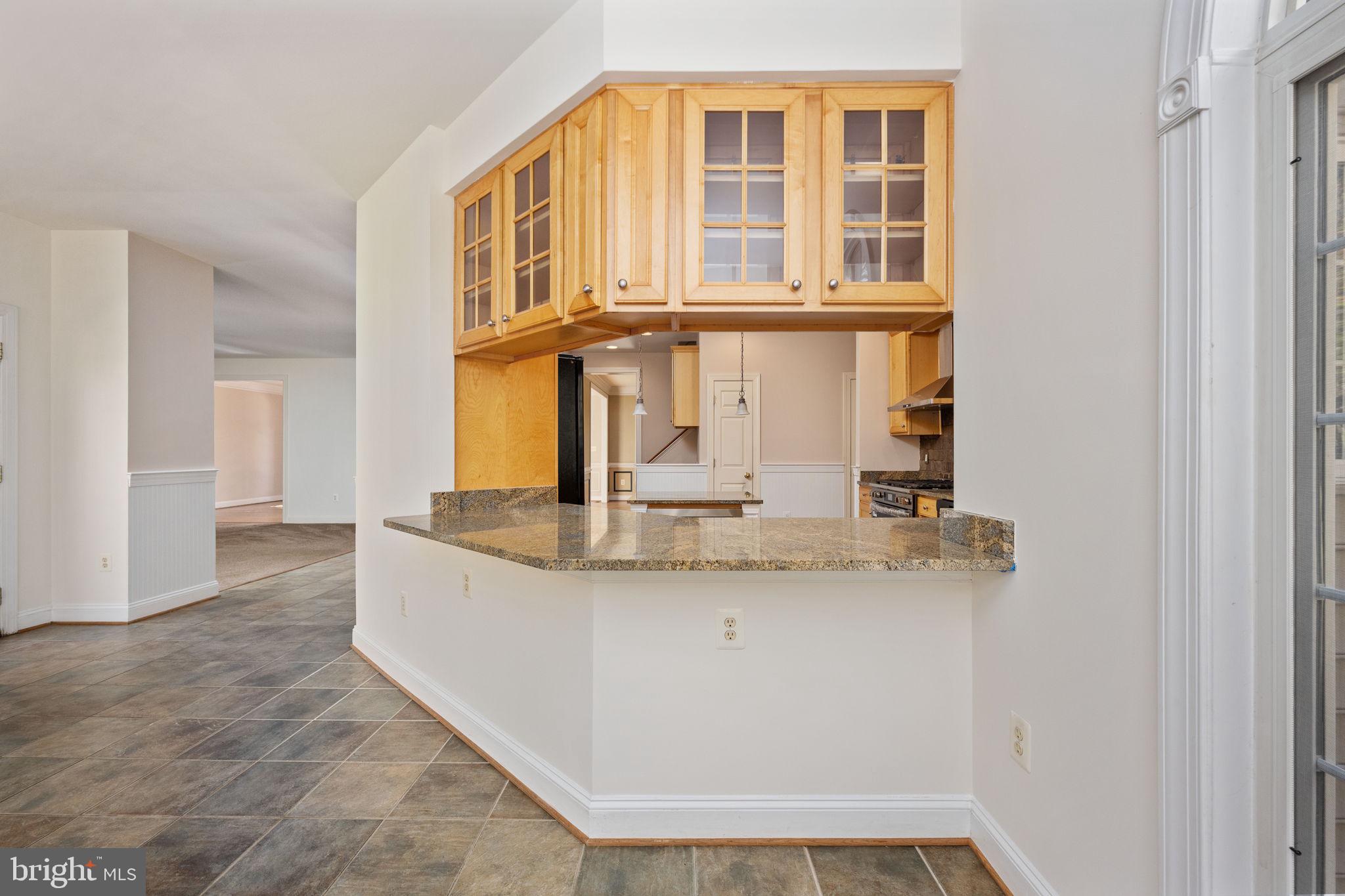 231 Kimberwick Lane Stafford, VA 22556 - Photo 28 of 78 a view of a kitchen with granite countertop a sink and a window