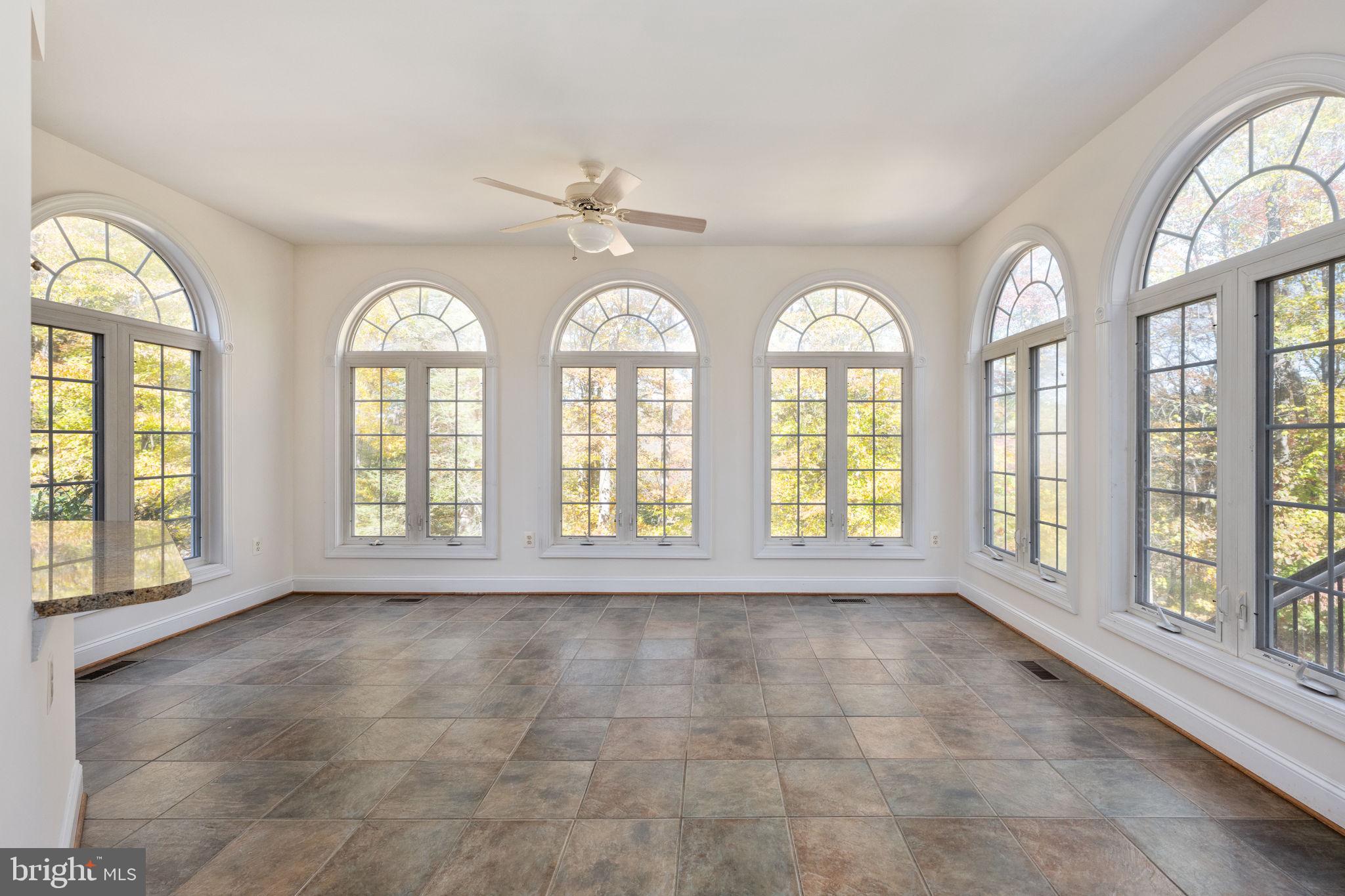 231 Kimberwick Lane Stafford, VA 22556 - Photo 34 of 78 a view of an empty room with a large window and wooden floor