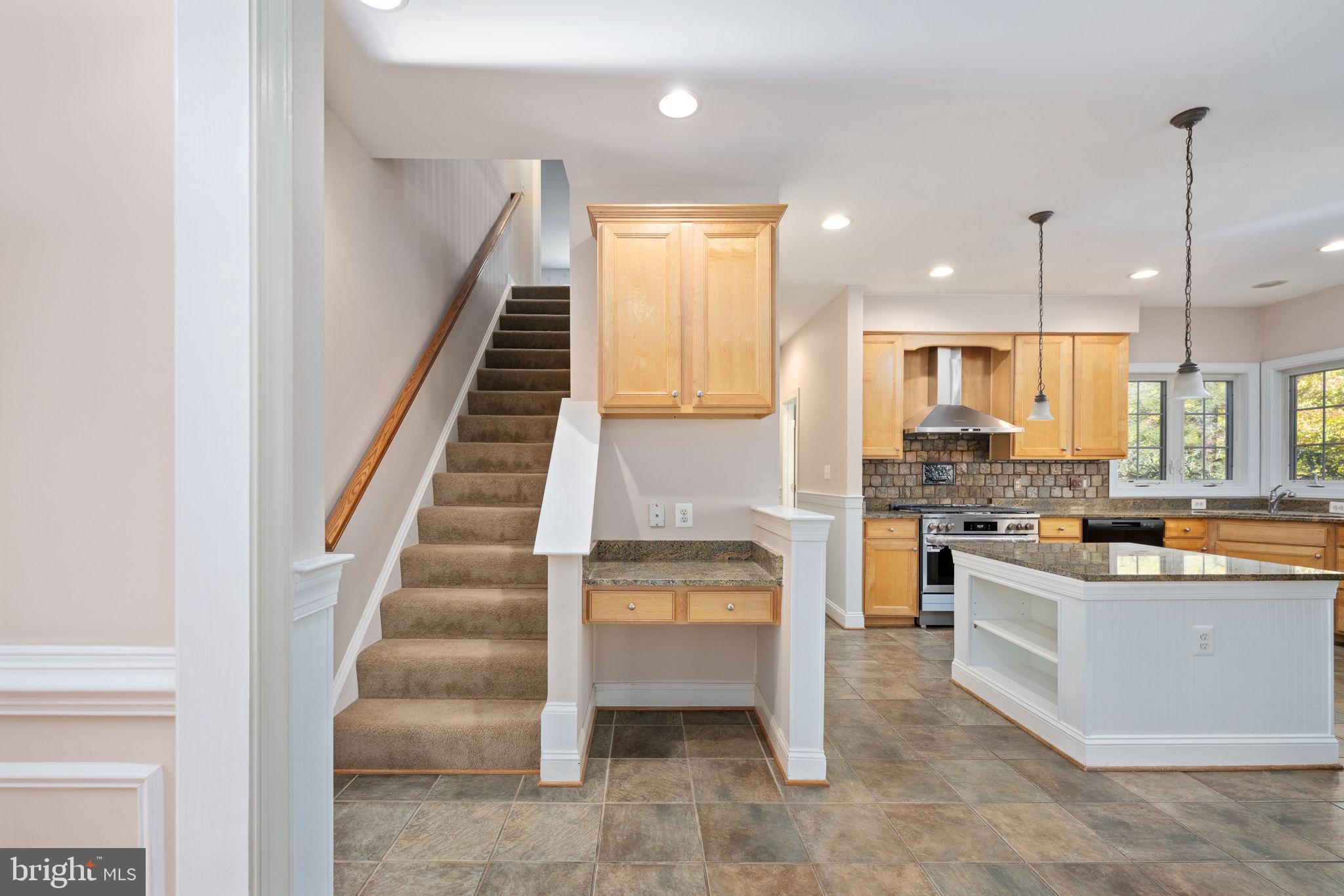 231 Kimberwick Lane Stafford, VA 22556 - Photo 35 of 78 a kitchen with white cabinets and white appliances