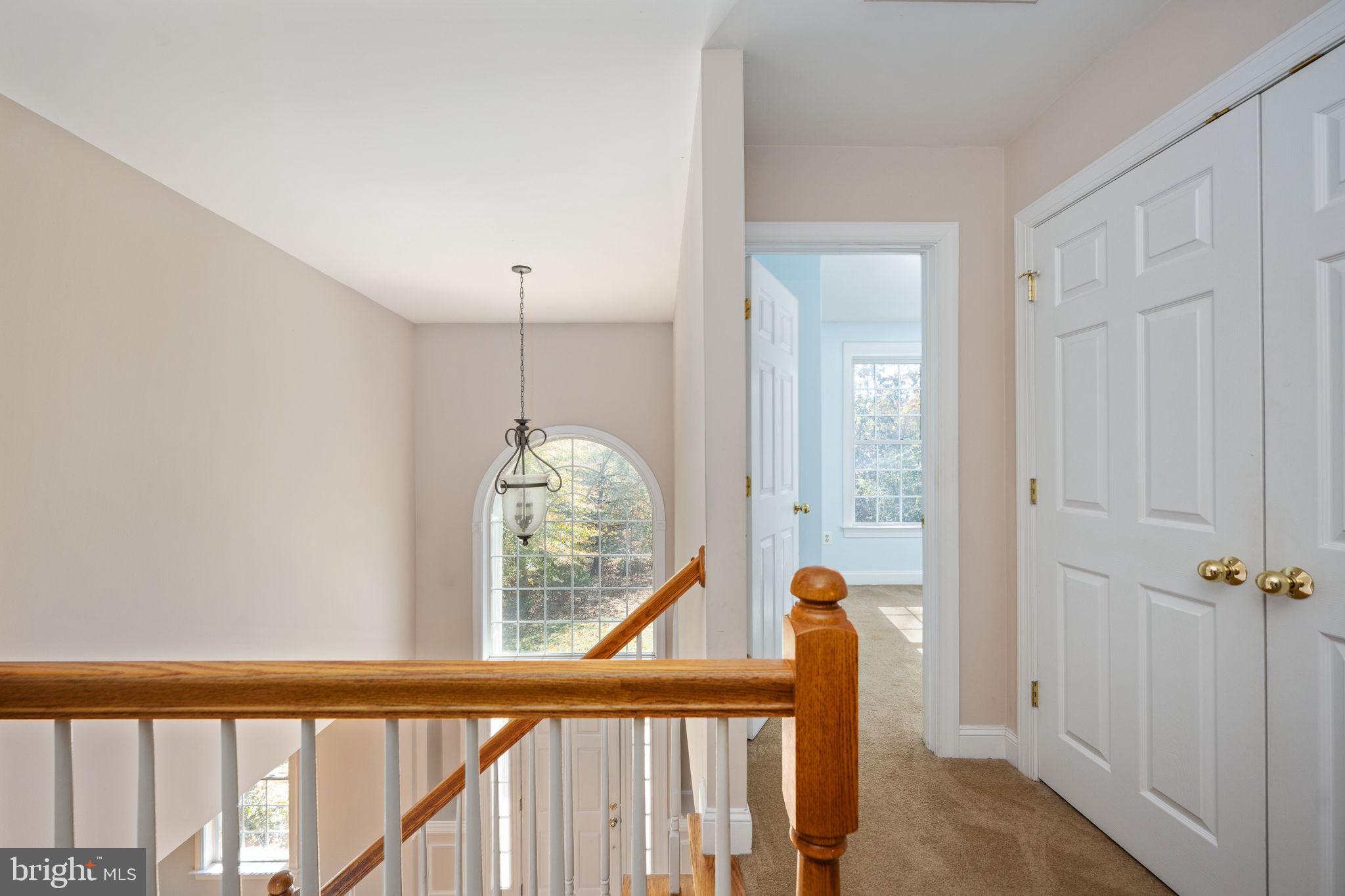 231 Kimberwick Lane Stafford, VA 22556 - Photo 46 of 78 a view of a hallway to a livingroom with furniture
