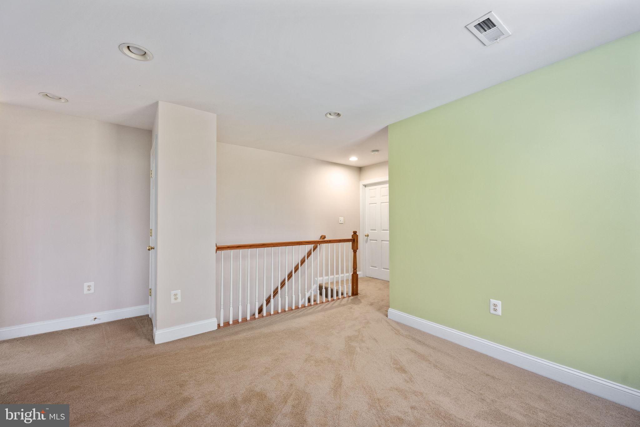 231 Kimberwick Lane Stafford, VA 22556 - Photo 47 of 78 a view of an empty room with wooden floor