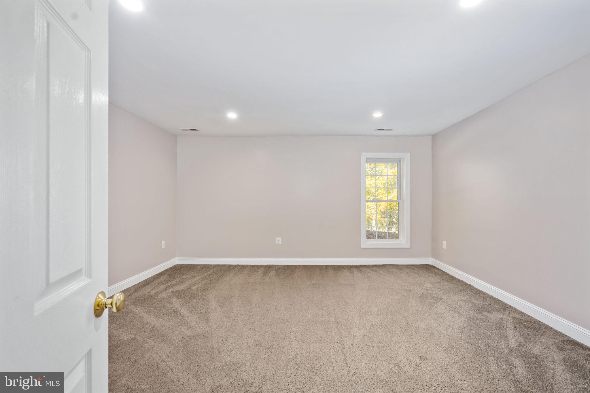 231 Kimberwick Lane Stafford, VA 22556 - Photo 58 of 78 a view of an empty room with a window