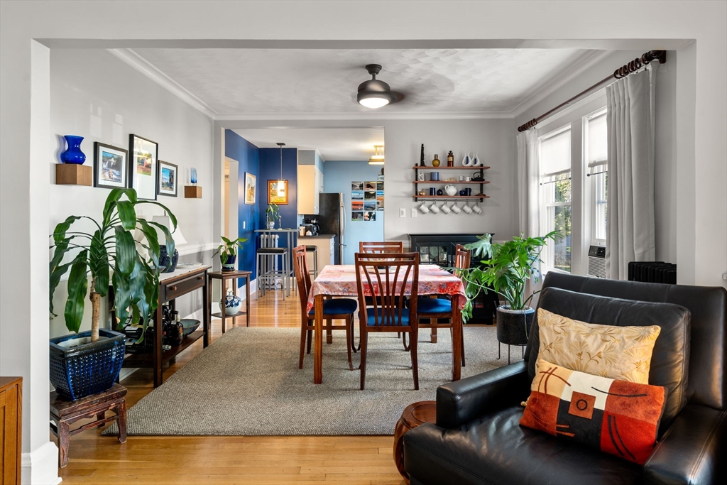 15 Berkshire Road, Unit 1 Waltham, MA 02453 - Photo 13 of 42 a living room with furniture and a flat screen tv
