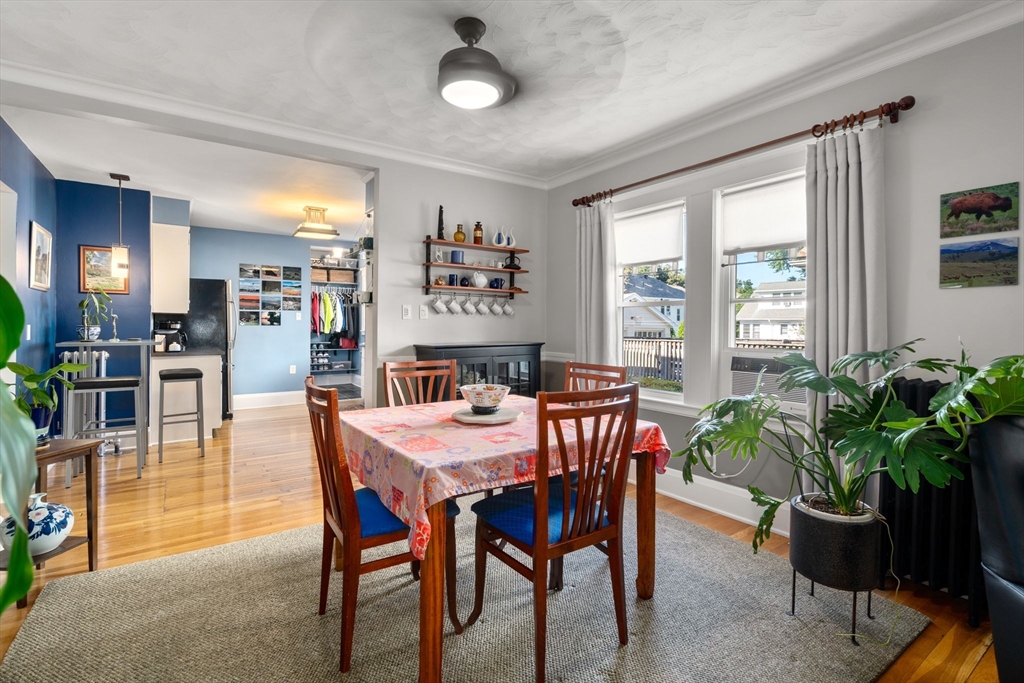 15 Berkshire Road, Unit 1 Waltham, MA 02453 - Photo 14 of 42 a view of a dining room with furniture window and outside view