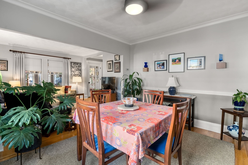 15 Berkshire Road, Unit 1 Waltham, MA 02453 - Photo 15 of 42 a dining room with furniture and window