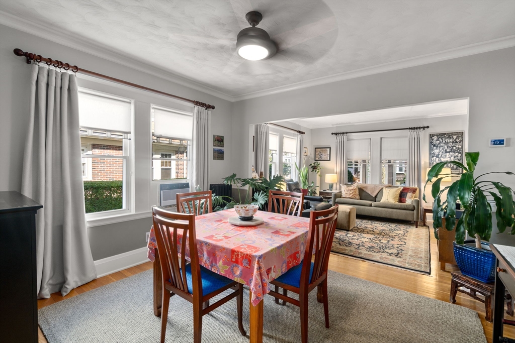 15 Berkshire Road, Unit 1 Waltham, MA 02453 - Photo 16 of 42 a view of a dining room with furniture window and wooden floor