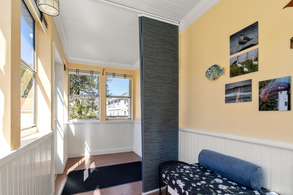 15 Berkshire Road, Unit 1 Waltham, MA 02453 - Photo 33 of 42 a bedroom with a bed and a window