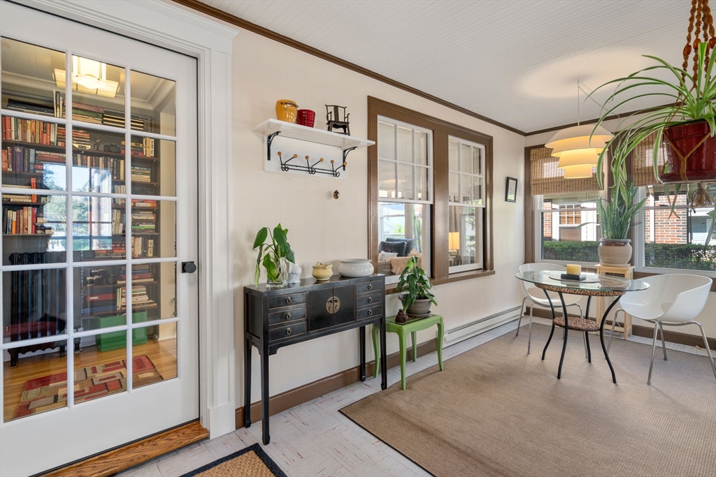 15 Berkshire Road, Unit 1 Waltham, MA 02453 - Photo 5 of 42 a living room with furniture and a potted plant