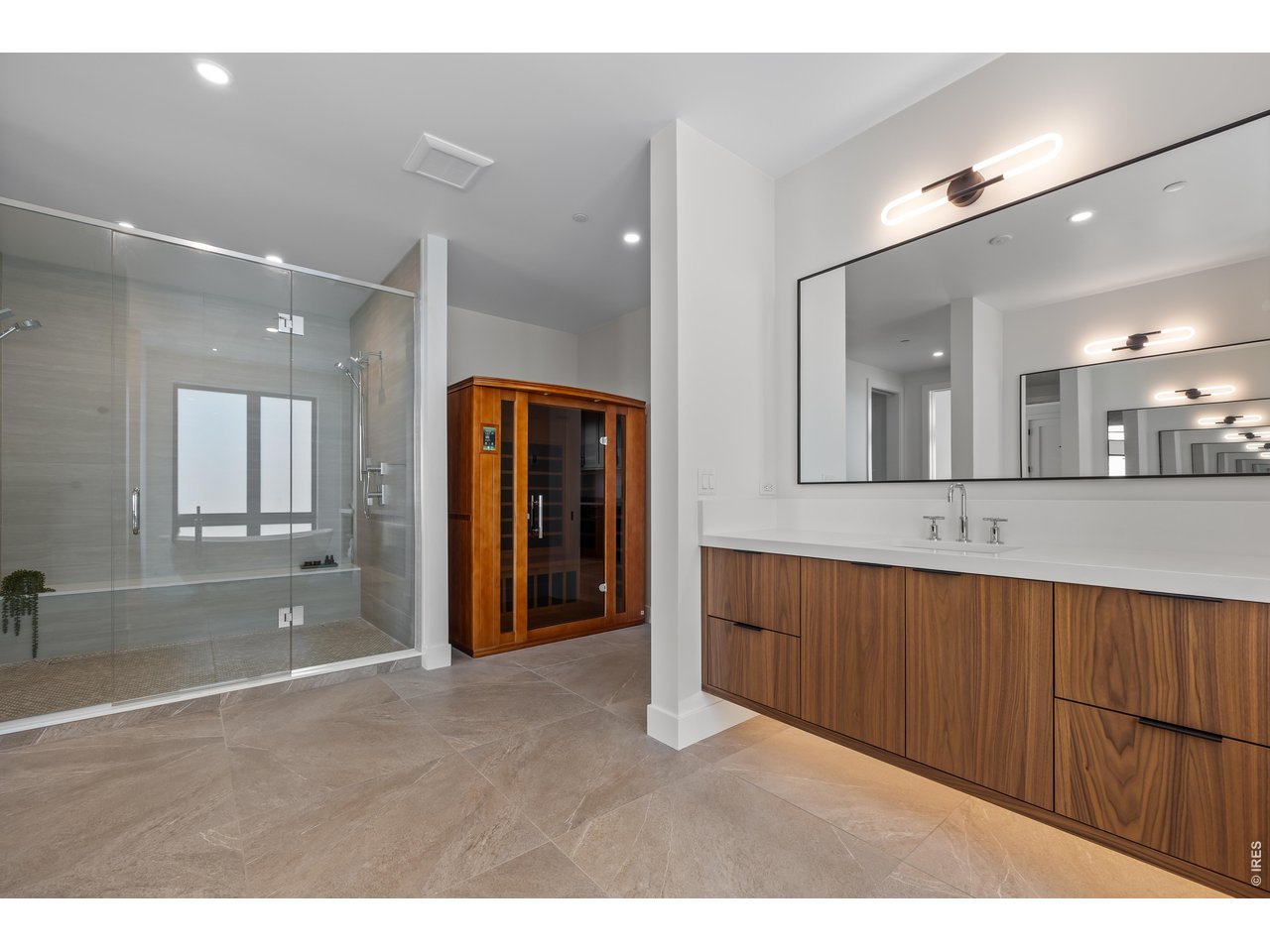 9578 Mountain Ridge Drive Boulder, CO 80302 - Photo 26 of 47 a view of a hallway with wooden floor