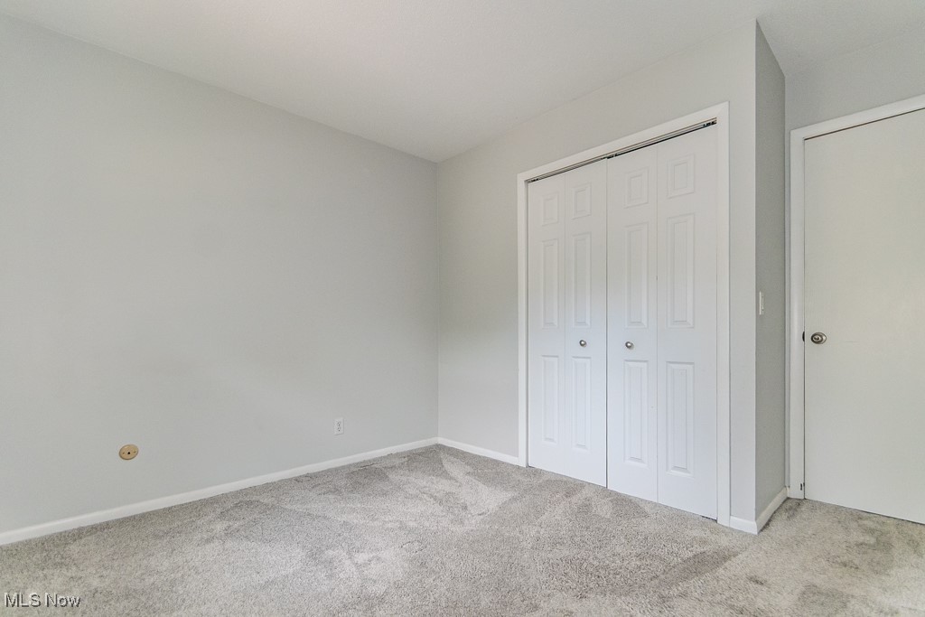 2969 Gale Road Willoughby, OH 44094 - Photo 13 of 46 Unfurnished bedroom with carpet and a closet