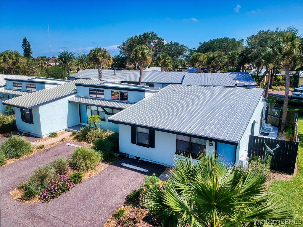 a aerial view of a house with a garden
