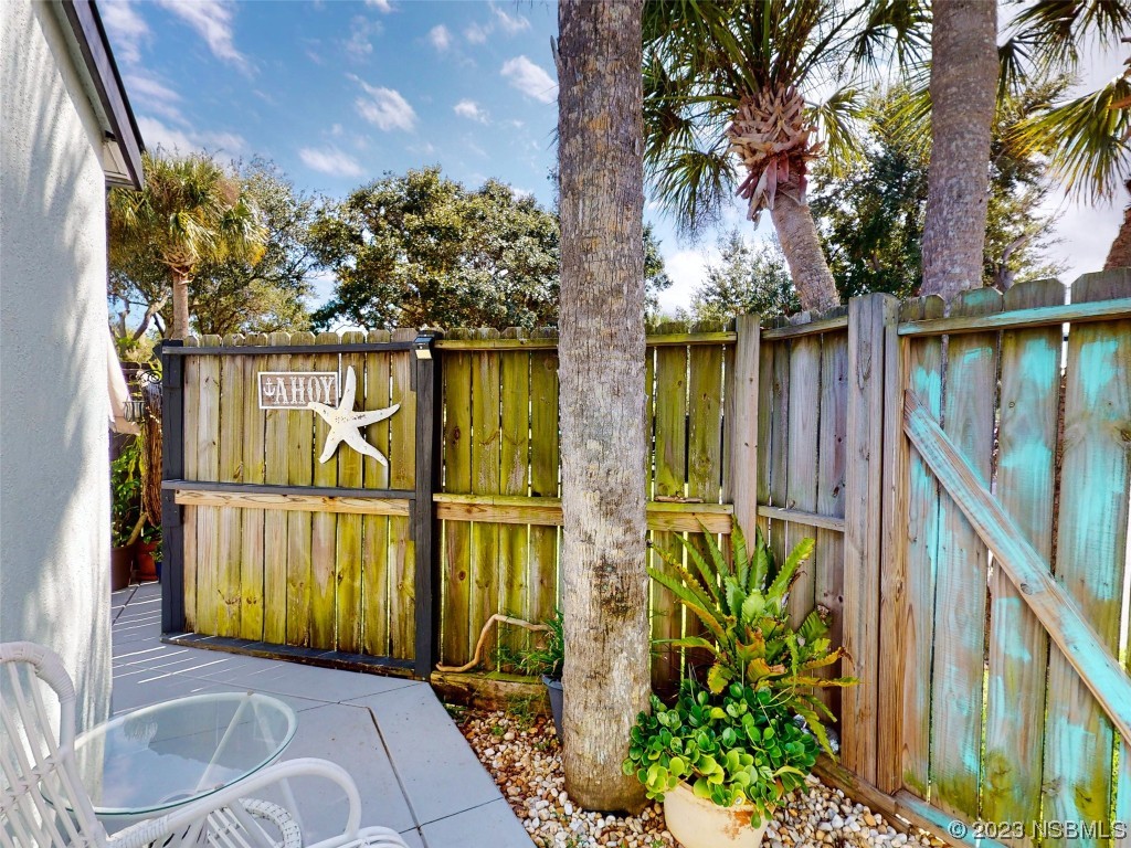 69 Sabal Cay Court, Unit 690 New Smyrna Beach, FL 32169 - Photo 18 of 30 a view of balcony with wooden floor