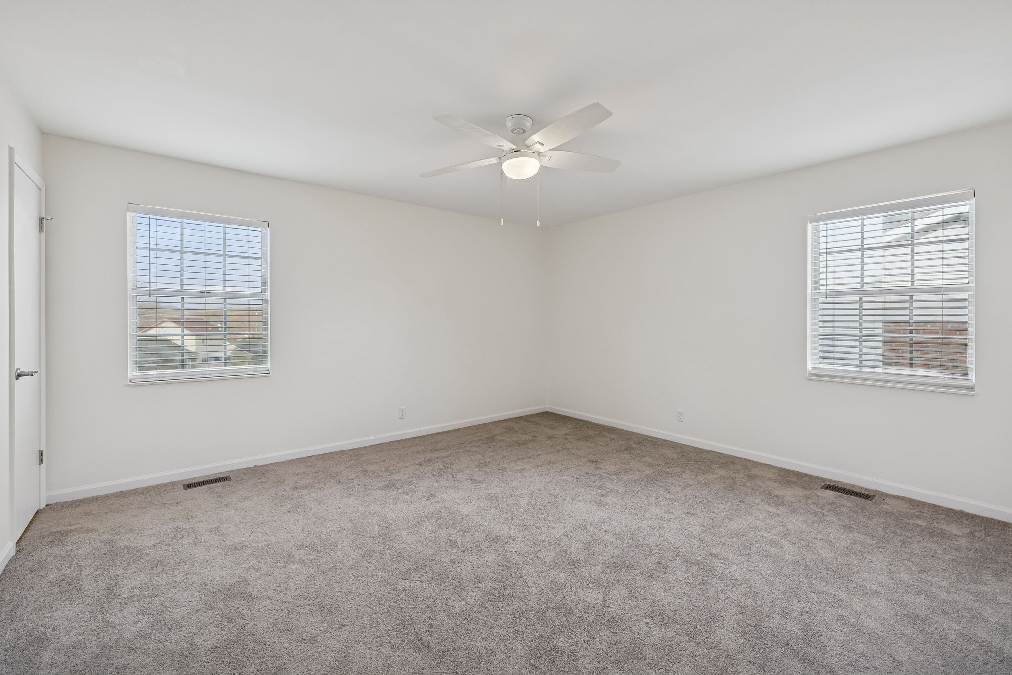 1108 Jacksons View Road Hermitage, TN 37076 - Photo 13 of 36 an empty room with a window and ceiling fan