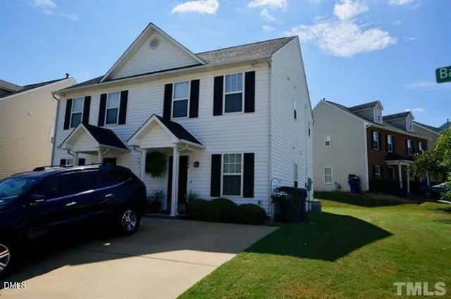 a house view with a garden space