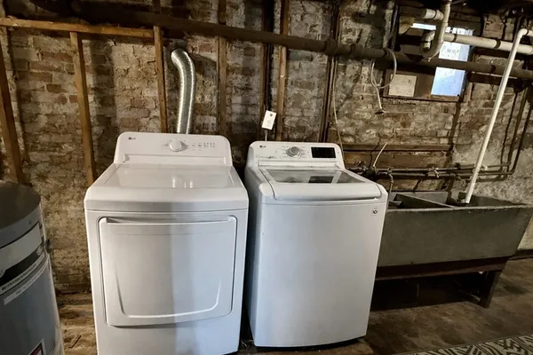 a utility room with dryer and washer