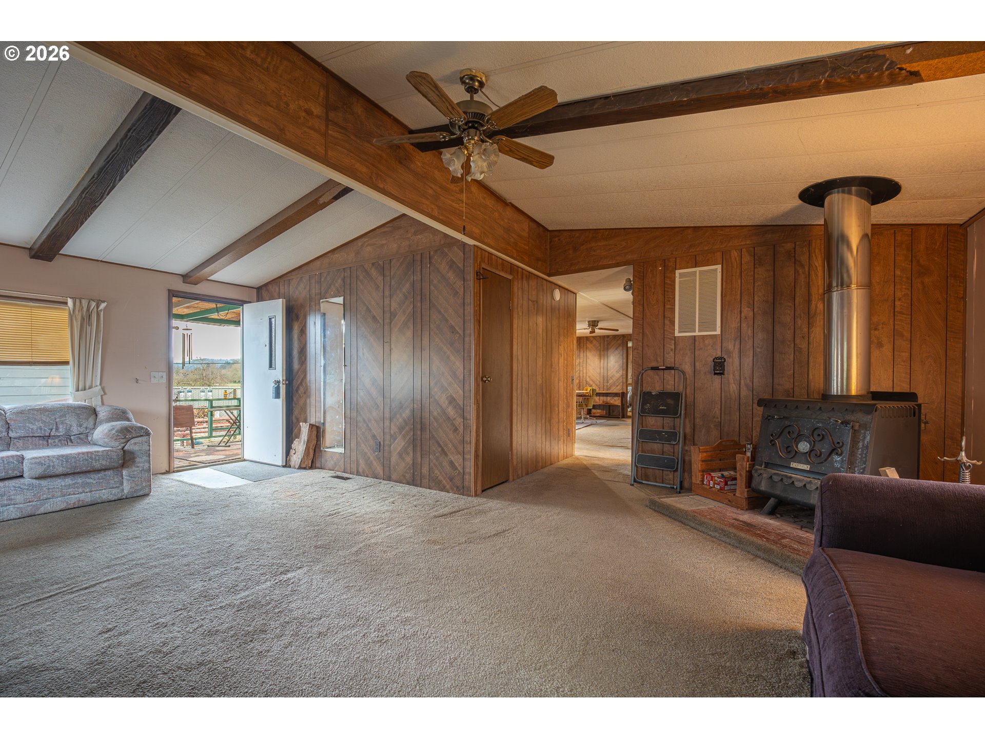 3393 Snow Peak Place Lebanon, OR 97355 - Photo 13 of 13 a view of livingroom with furniture and a ceiling fan