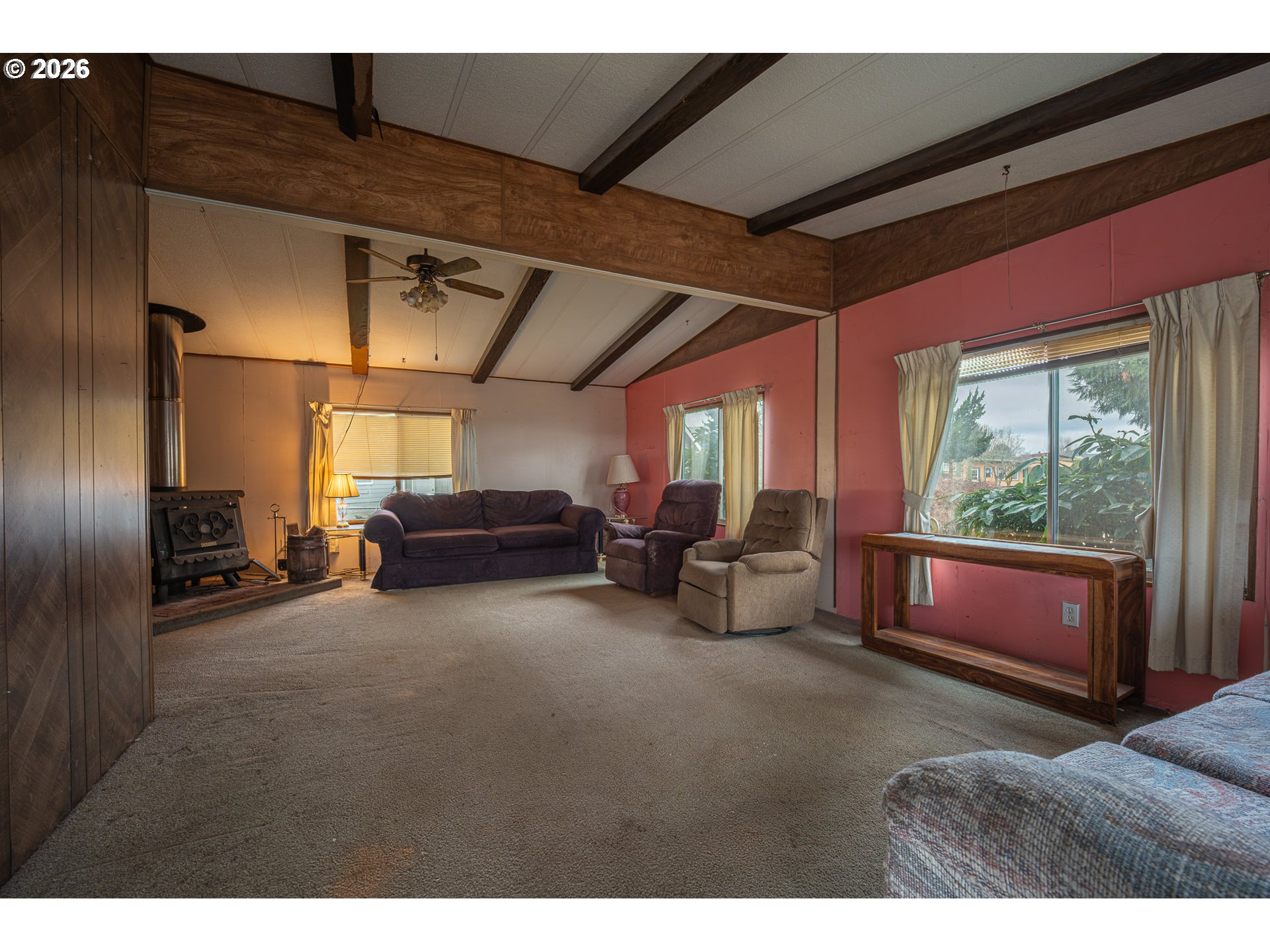 3393 Snow Peak Place Lebanon, OR 97355 - Photo 5 of 13 a living room with furniture and a window