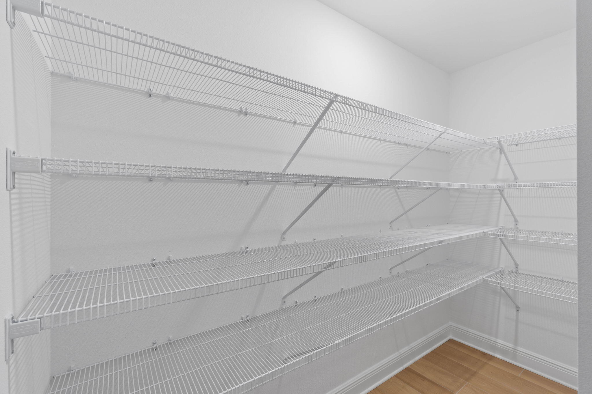 6752 Redfield Street Navarre, FL 32566 - Photo 14 of 64 a view of small space with racks on the wall