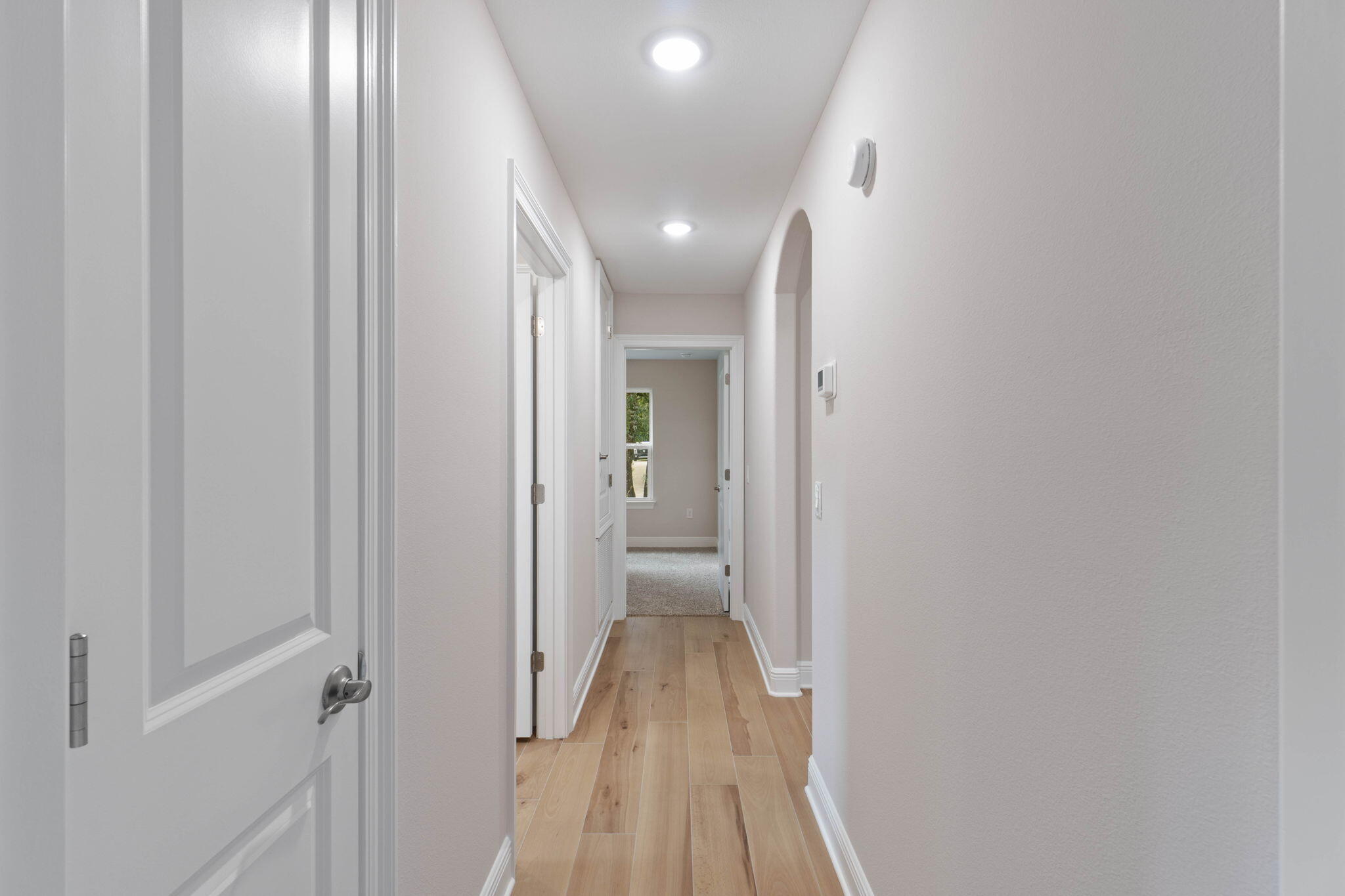 6752 Redfield Street Navarre, FL 32566 - Photo 20 of 64 a view of hallway with wooden floor