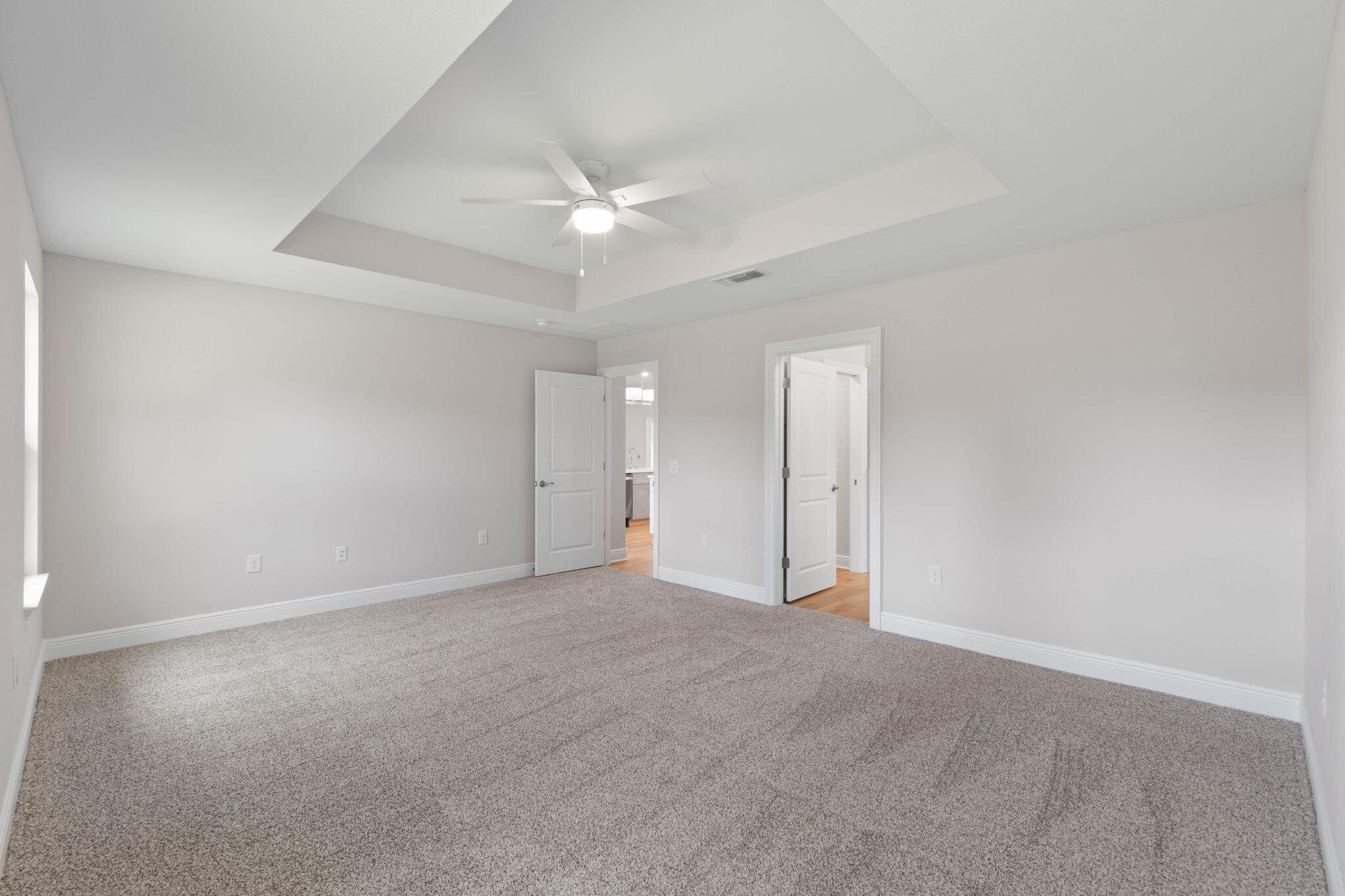 6752 Redfield Street Navarre, FL 32566 - Photo 22 of 64 an empty room with a ceiling fan and a fan
