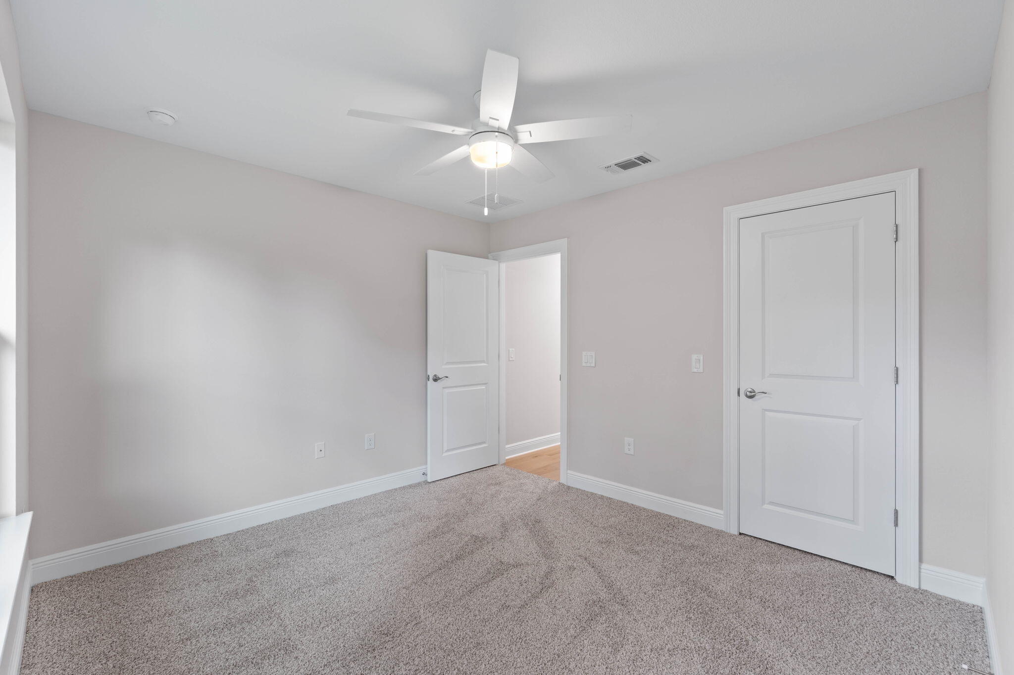 6752 Redfield Street Navarre, FL 32566 - Photo 31 of 64 wooden floor in an empty room