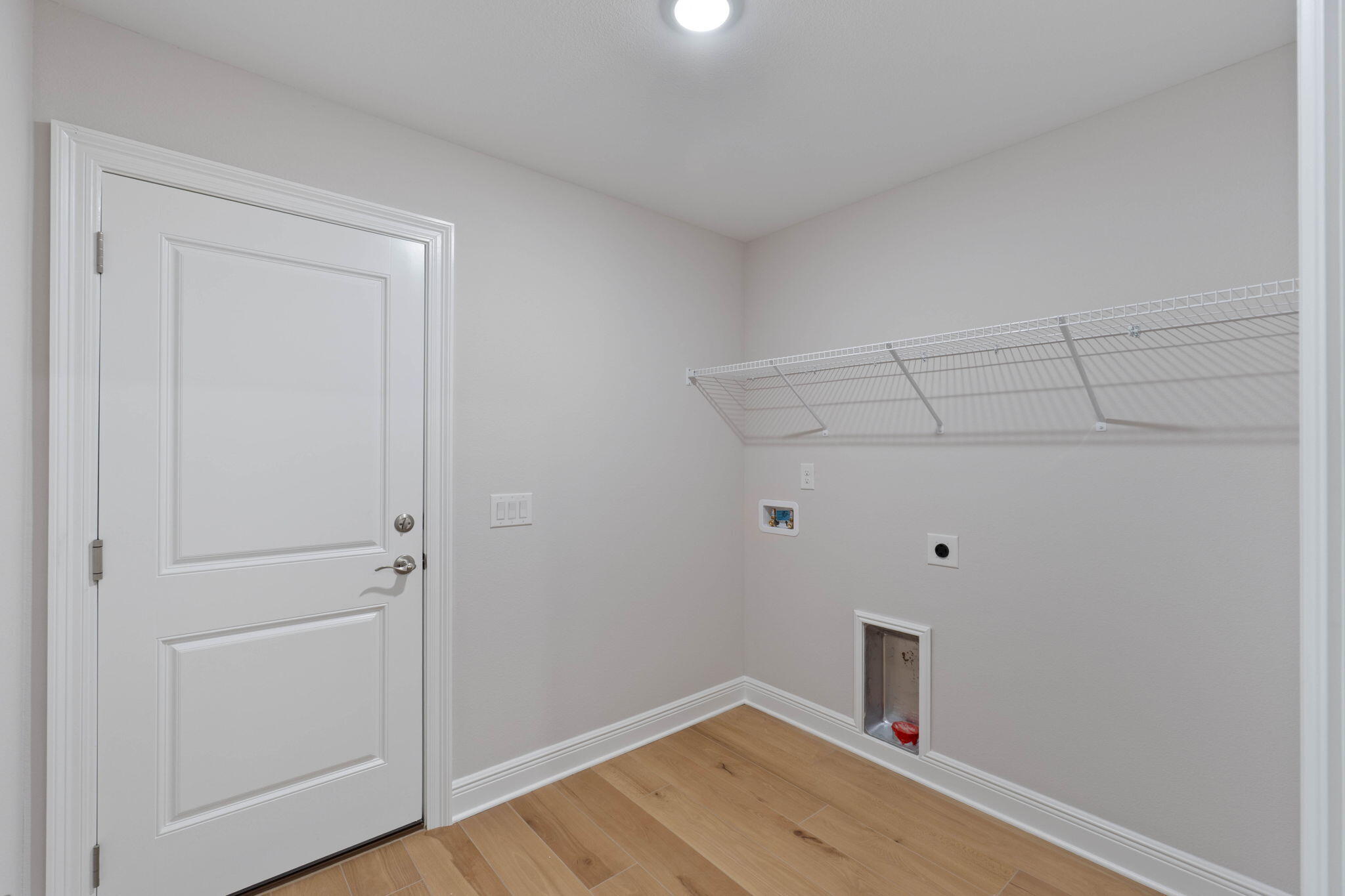 6752 Redfield Street Navarre, FL 32566 - Photo 40 of 64 a view of small space with racks on the wall