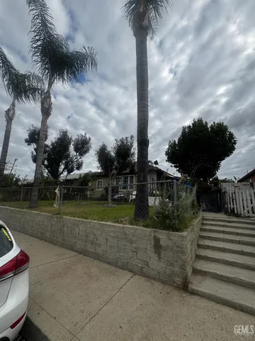 a view of a garden with a bench