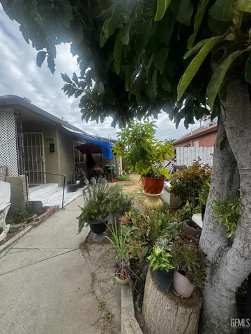 a view of a lake with couches and city view