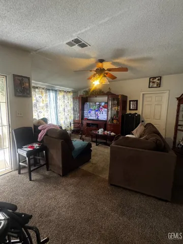 a kitchen with lots of counter top space and cabinets