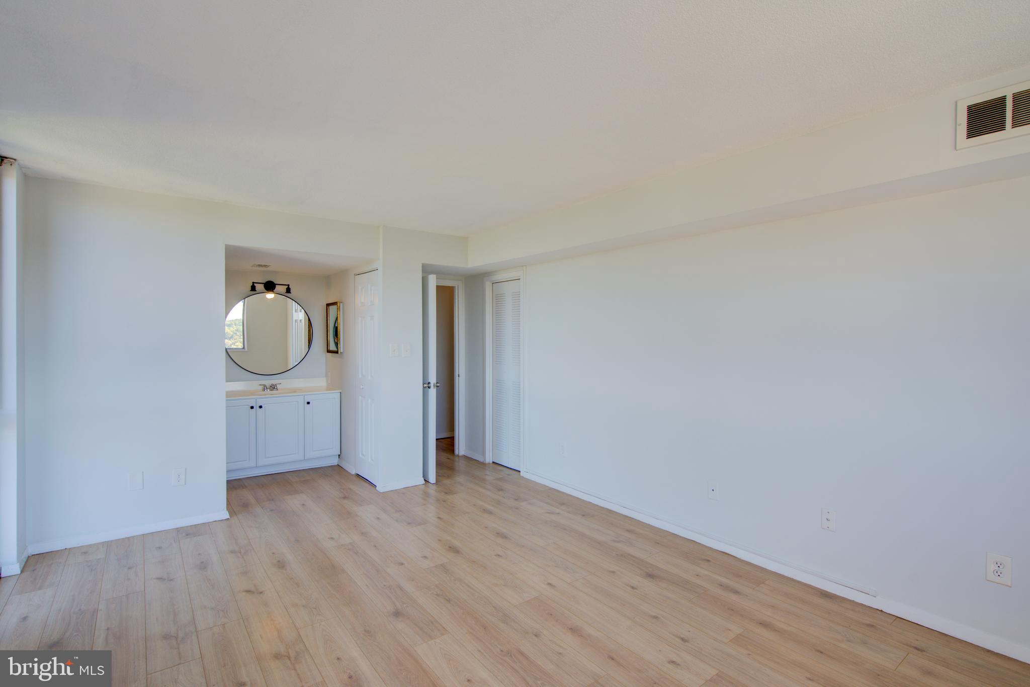 1836 Metzerott Road, Unit 1901 Hyattsville, MD 20783 - Photo 23 of 38 Primary Bedroom with Bathroom