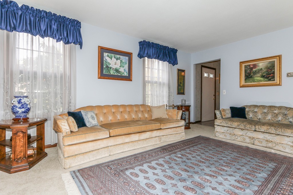 1016 Frank Smith Road Longmeadow, MA 01106 - Photo 4 of 28 a living room with furniture and a couch