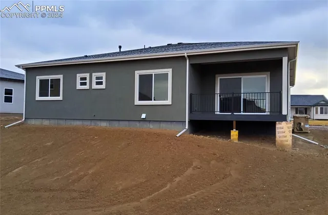 a view of a house with a swimming pool
