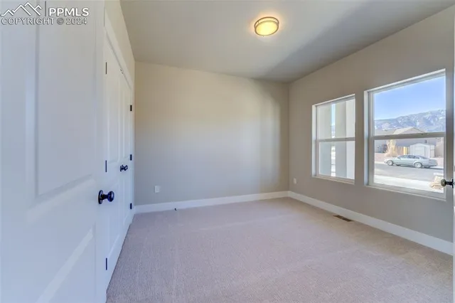 an empty room with windows