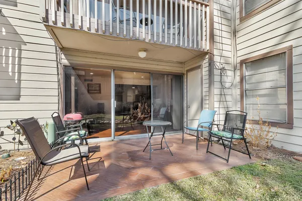 a building outdoor space with patio furniture