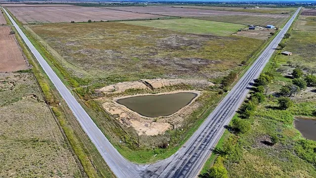 a view of swimming pool from a balcony