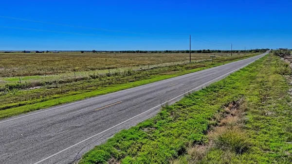 a view of an ocean with a city view