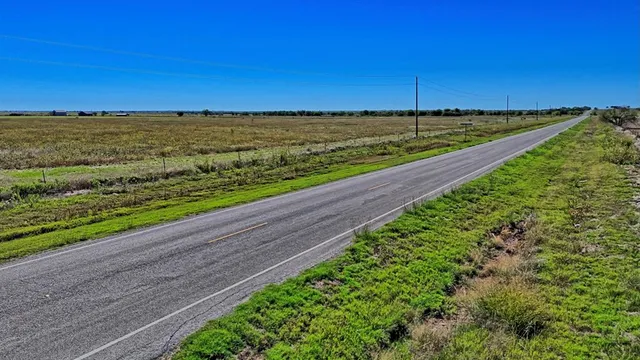 a view of an ocean with a city view