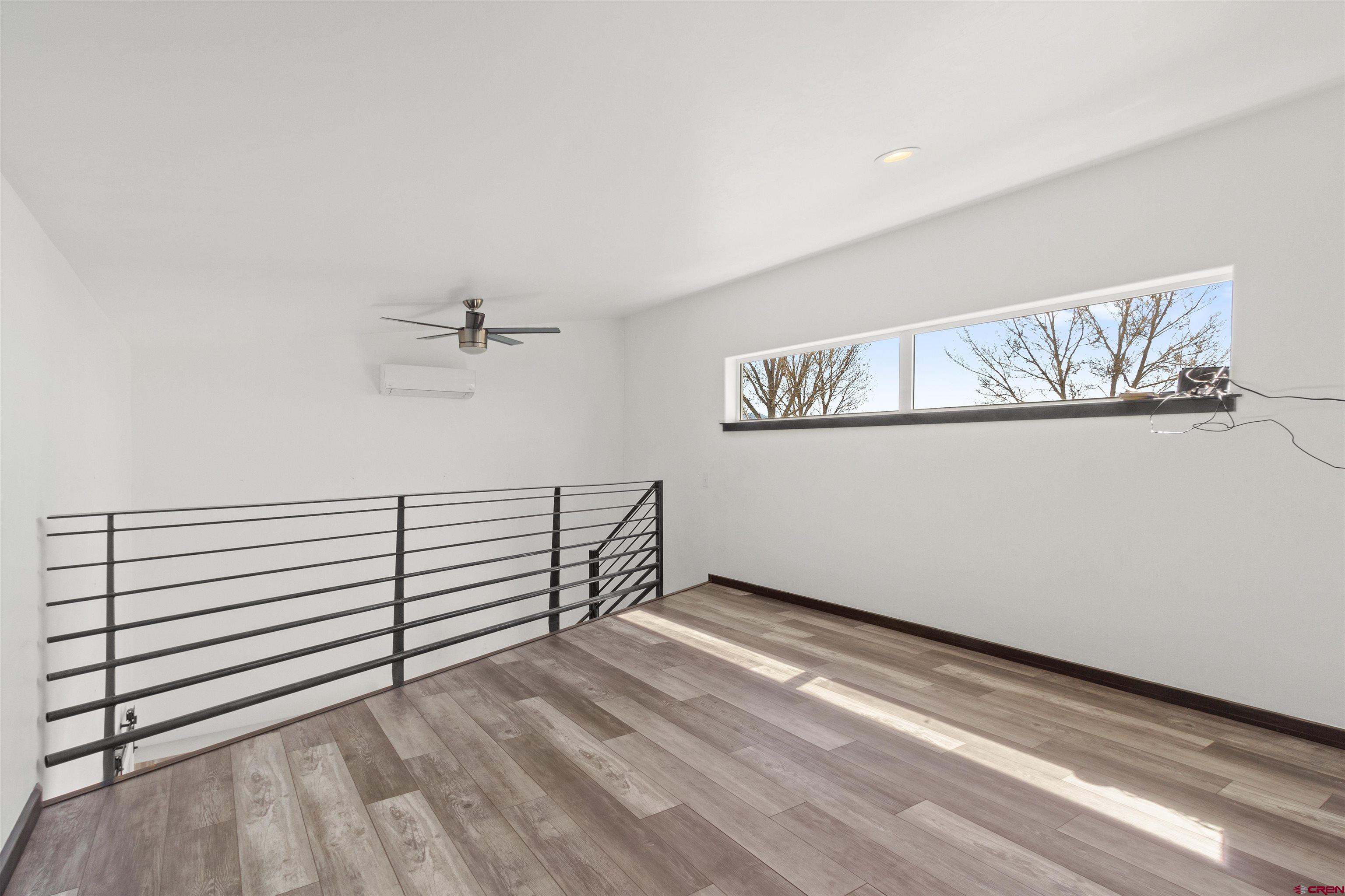 2192 Odelle Road Montrose, CO 81401 - Photo 33 of 45 a view of a room with racks on the wall
